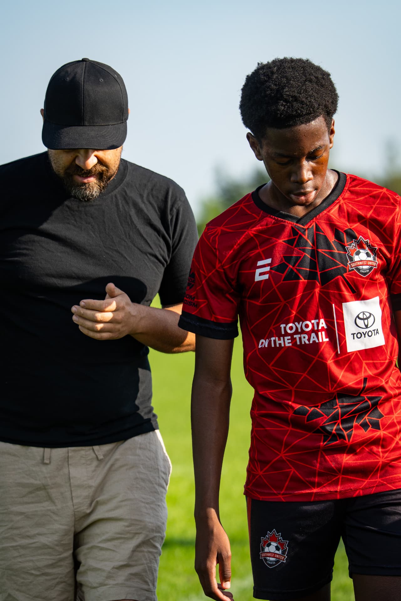 SWU coach and player showing respect on the pitch